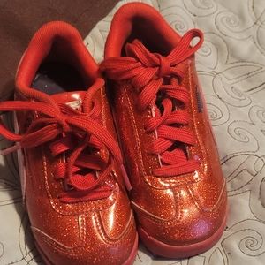 Red sparkly Pumas